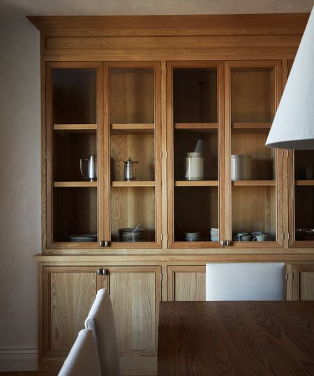 wood joinery with silver door handles and nickel jugs displayed inside