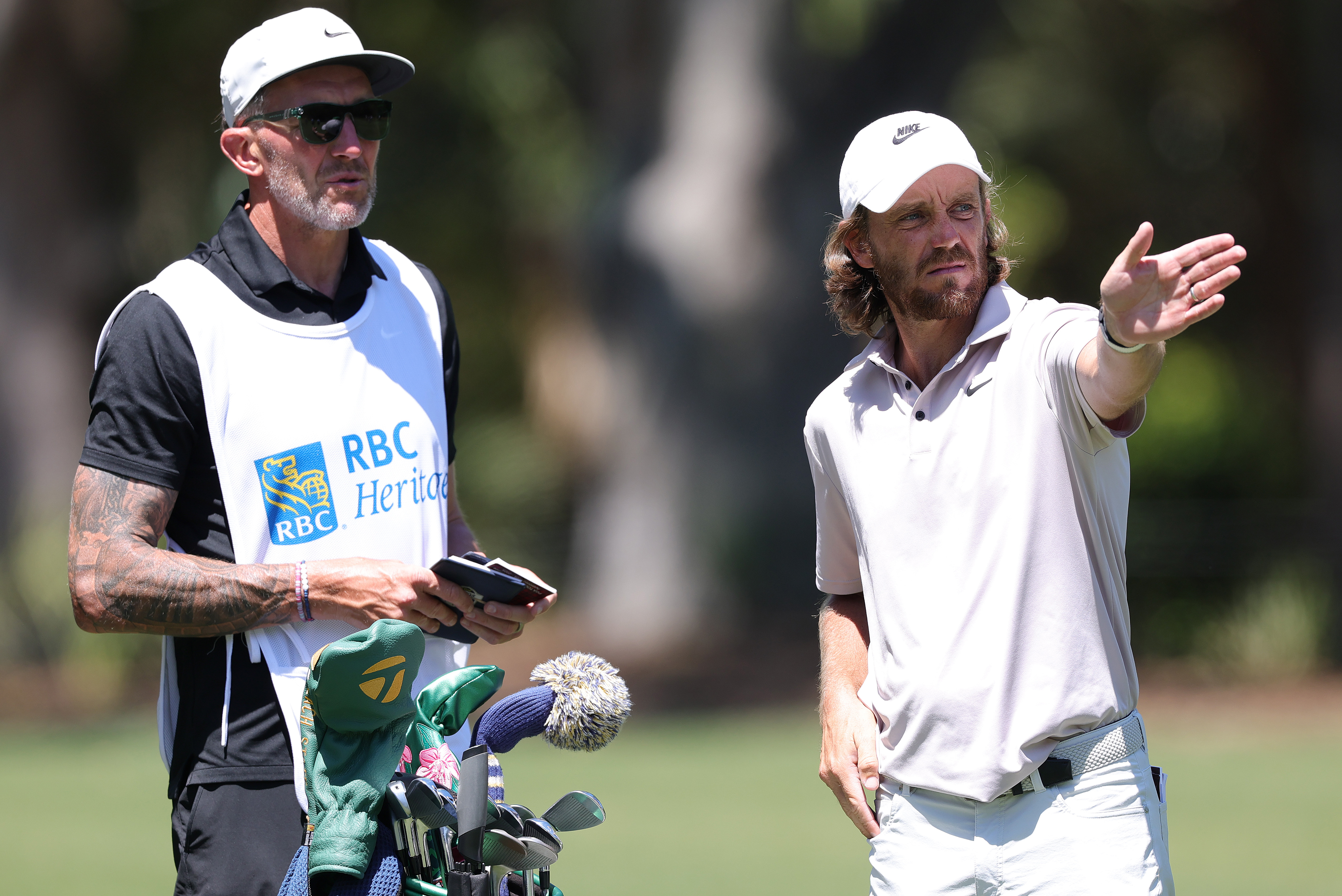 Tommy Fleetwood and his caddie