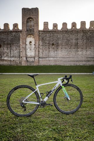 BMC Kaius in front of wall ruin