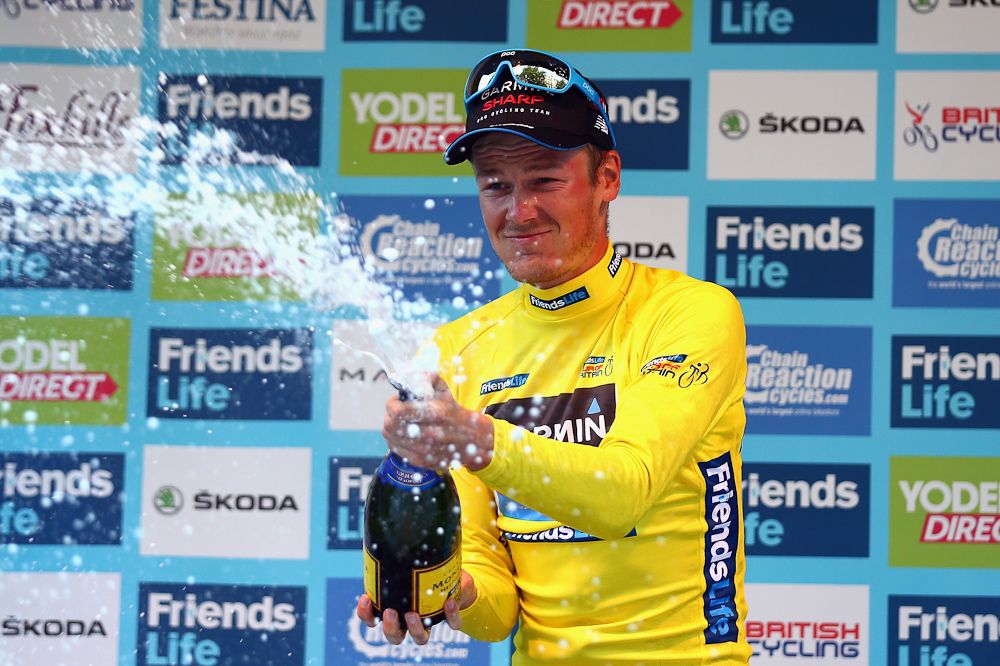 Dylan van Baarle celebrates his victory on the podium after the final stage of the 2014 Tour of Britain.