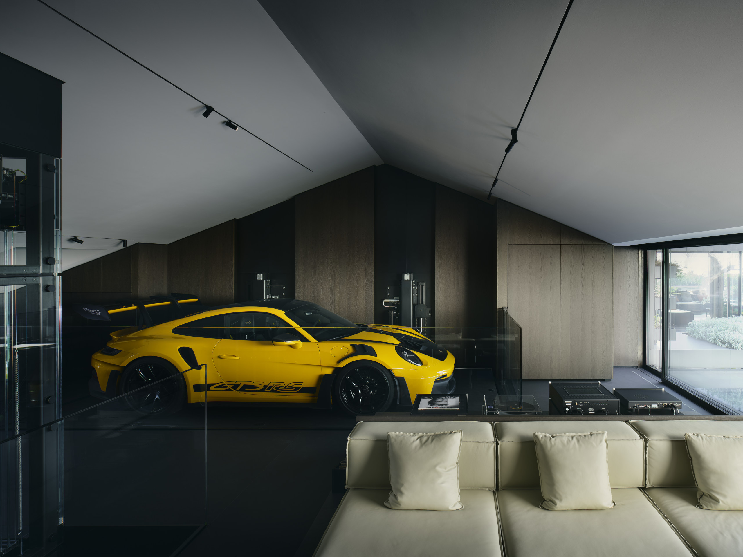 The car lift rises all the way to the reception room on the uppermost floor