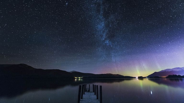 stars in the sky across water