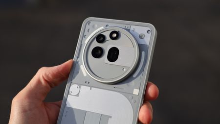 Close-up of the cameras on a Nothing (3a) Pro phone held in a hand