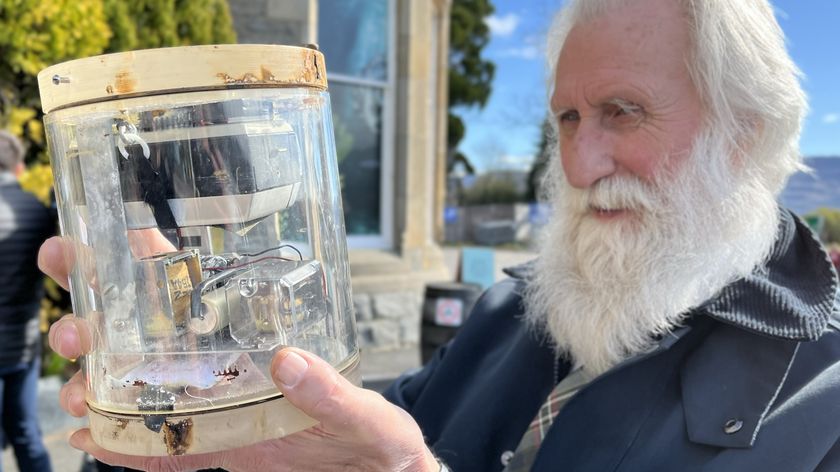 Researchers found a 1970 camera trap originally set up to research the Loch Ness legend. This image depicts the camera before restoration, held by researcher Adrian Shine