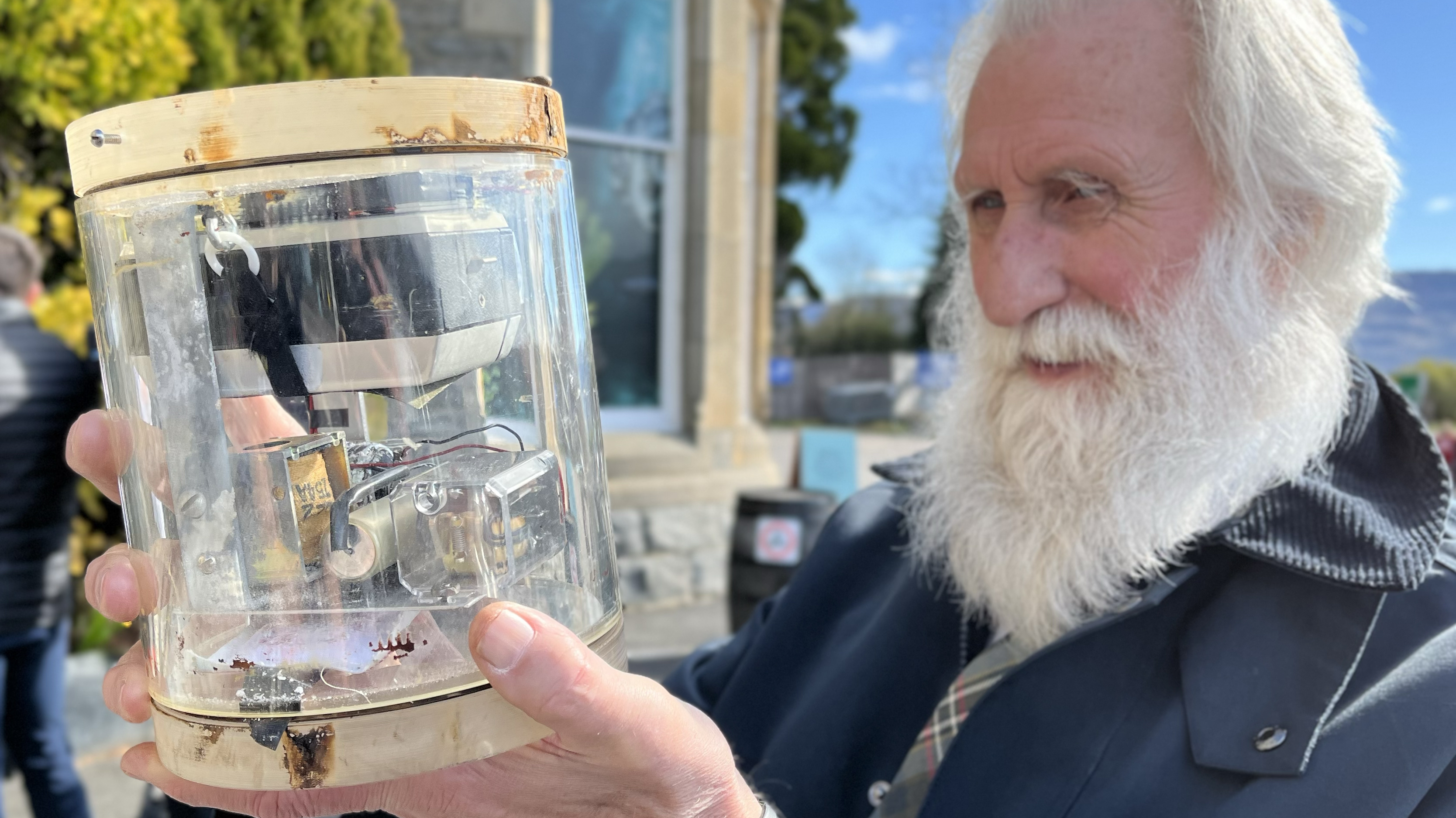 Researchers found a 1970 camera trap originally set up to research the Loch Ness legend. This image depicts the camera before restoration, held by researcher Adrian Shine