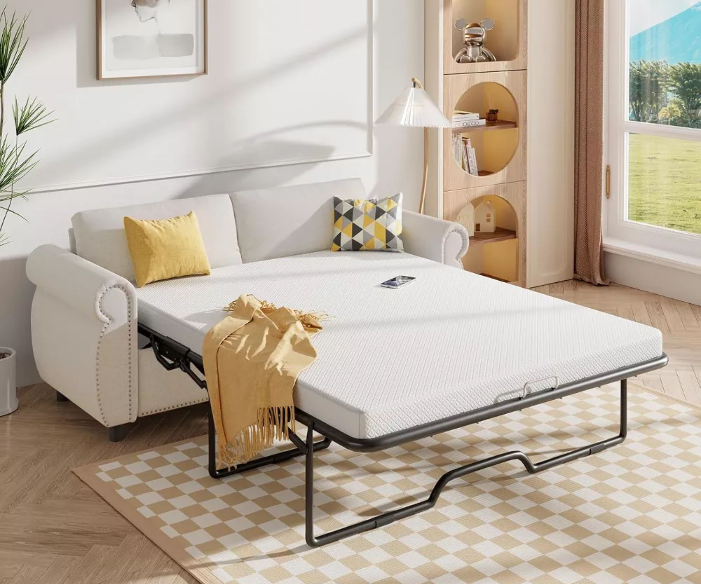 target sleeper sofa neutral pulled out with a mattress on a frame sat on a beige and white checkerboard rug