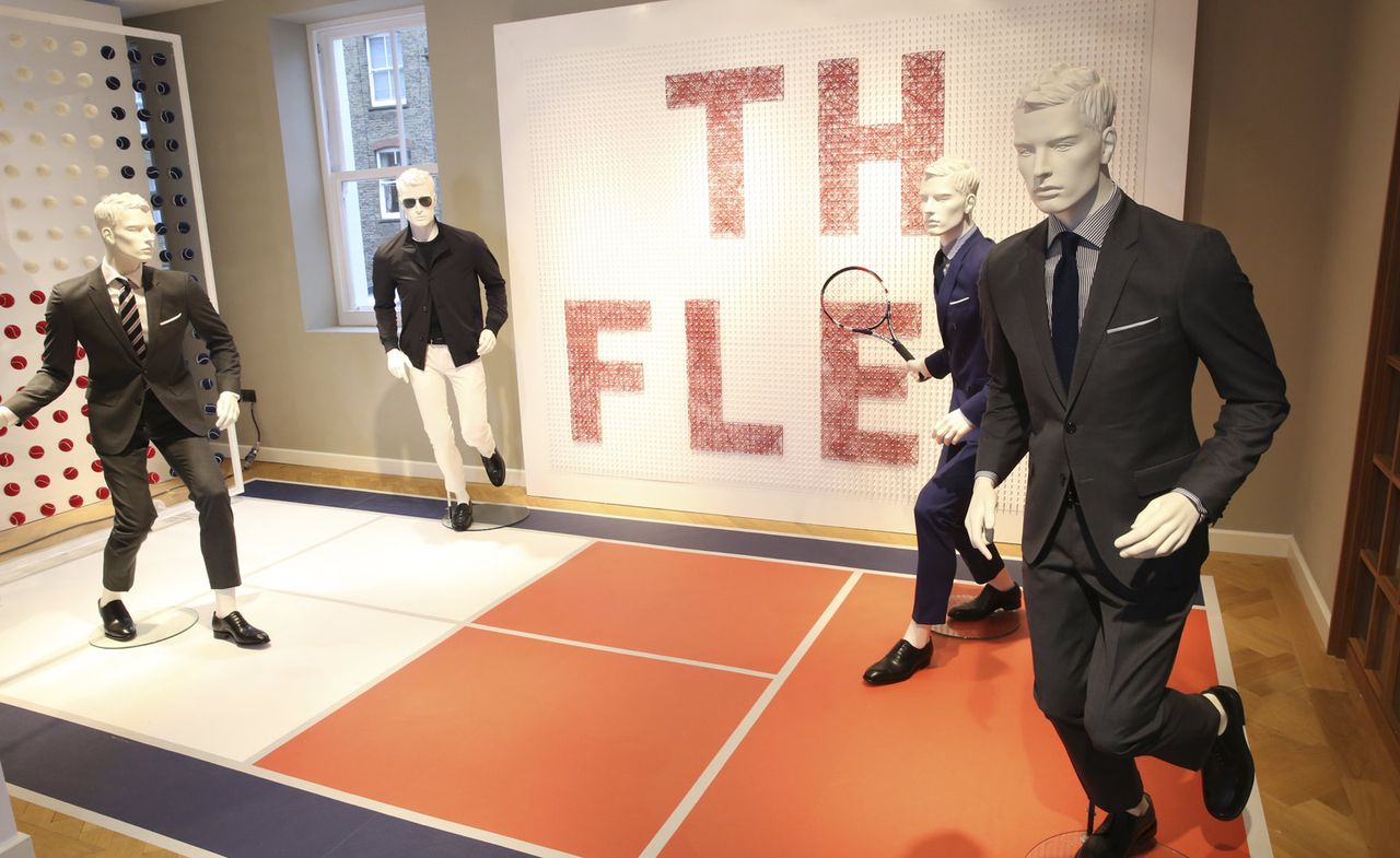 Male mannequins playing tennis wearing Tommy Hilfiger&#039;s 2016 Spring / Summer tailored collection