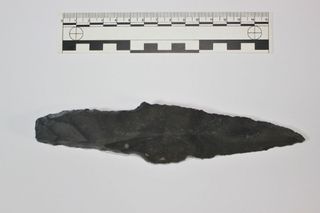 This obsidian knife blade found in Lake Petén Itzá could have been used for sacrifices, the researchers say.