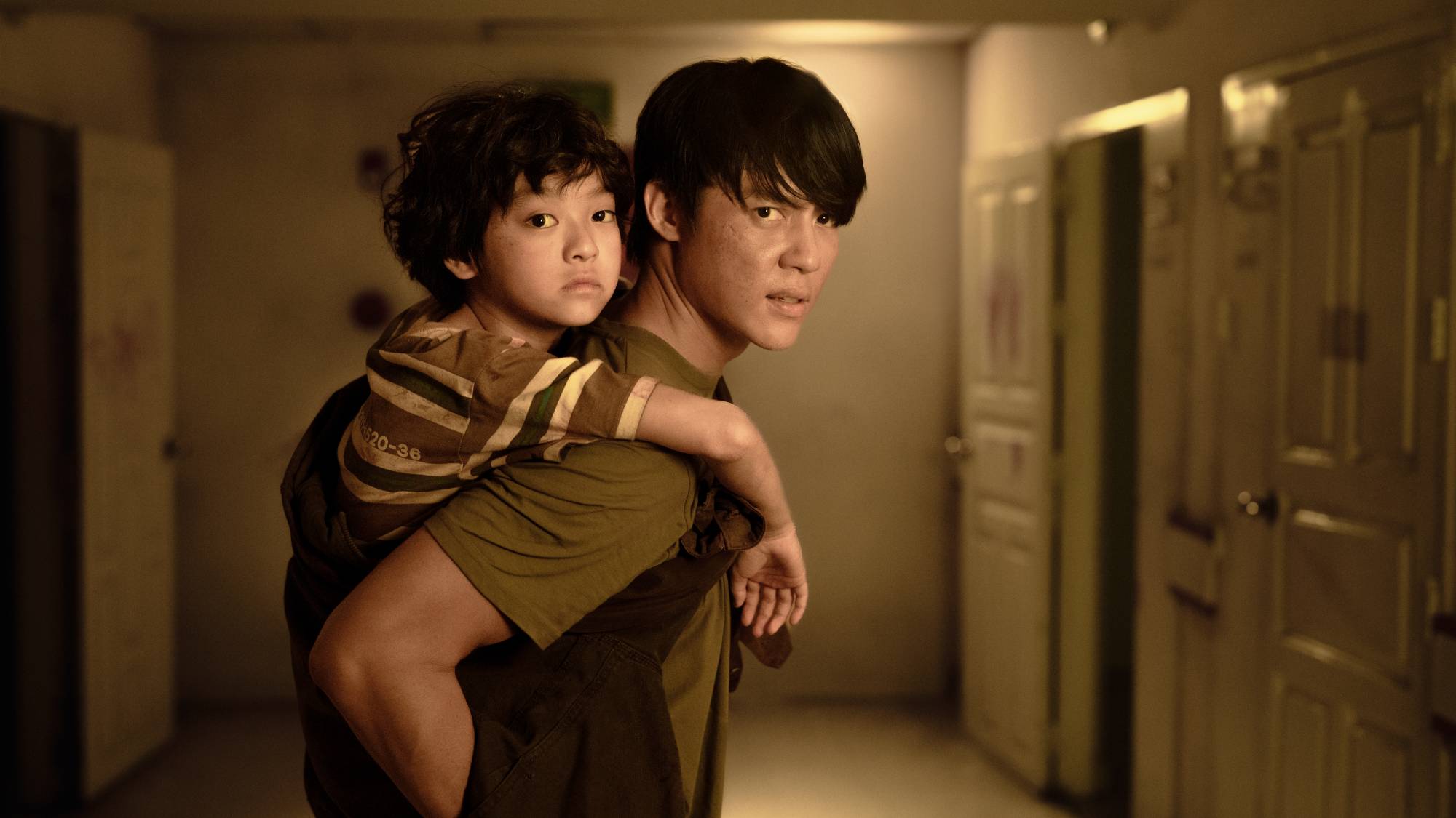 (L-R) Wanvayla Boonnithipaisit as Buddy and Prin Suparat as Singh in &quot;Ziam&quot; now streaming on Netflix