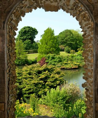 Sandringham estate viewed through a garden archway