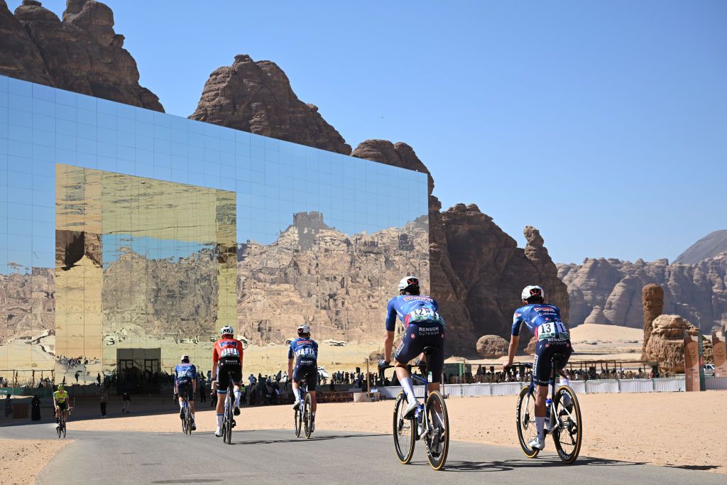 MARAYA SAUDI ARABIA JANUARY 31 Tim Merlier of Belgium Red Points Jersey Ayco Bastiaens of Belgium Thomas Pesenti of Italy Warre Vangheluwe of Belgium Bert Van Lerberghe of Belgium Jonathan Vervenne of Belgium Jordi Warlop of Belgium and Team Soudal QuickStep prior to the 5th AlUla Tour 2025 Stage 4 a 1409km stage from Maraya to Skyviews of Harrat Uwayrid 1159m on January 31 2025 in Maraya Saudi Arabia Photo by Szymon GruchalskiGetty Images
