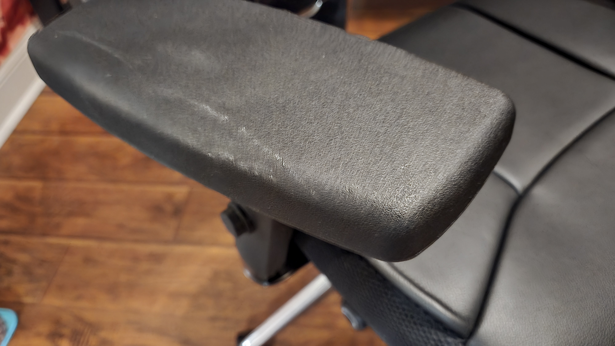 A closeup shot of one of the Oak Hallow Aloria&#039;s armrests which was scuffed during transit