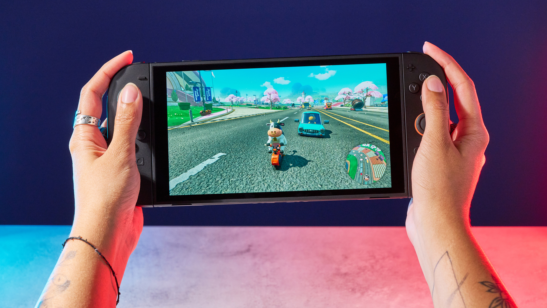 A Nintendo Switch 2 photographed under RGB lighting