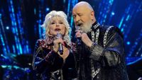 Dolly Parton and Rob Halford perform onstage during the 37th Annual Rock & Roll Hall of Fame Induction Ceremony at Microsoft Theater on November 05, 2022 in Los Angeles