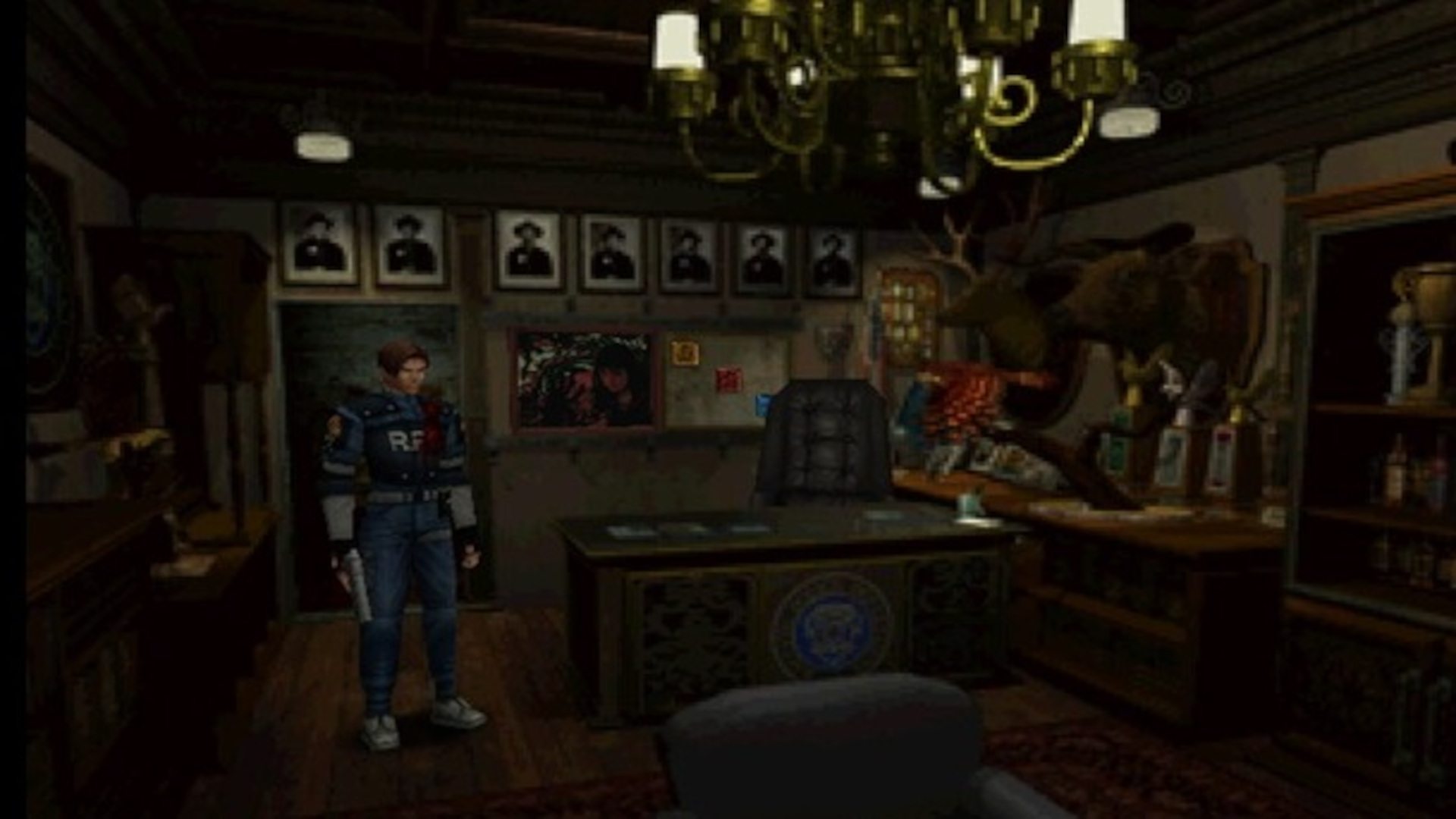 Leon Kennedy in his police uniform standing in the office in the Raccoon City police department in Resident Evil 2 (1998)