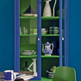 rich blue and green dining room cupboard