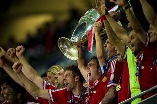 Bayern Munich players celebrate after winning the Champions League to complete a treble in 2013.