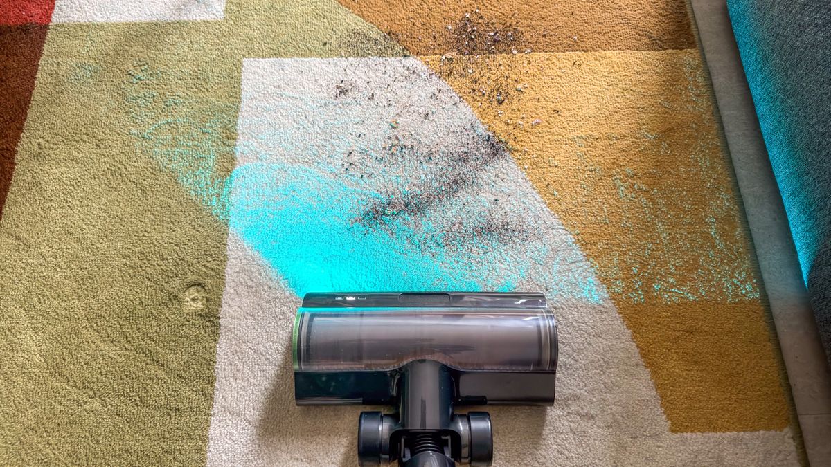 Dreame Z50 Station being used to clean a dirty rug