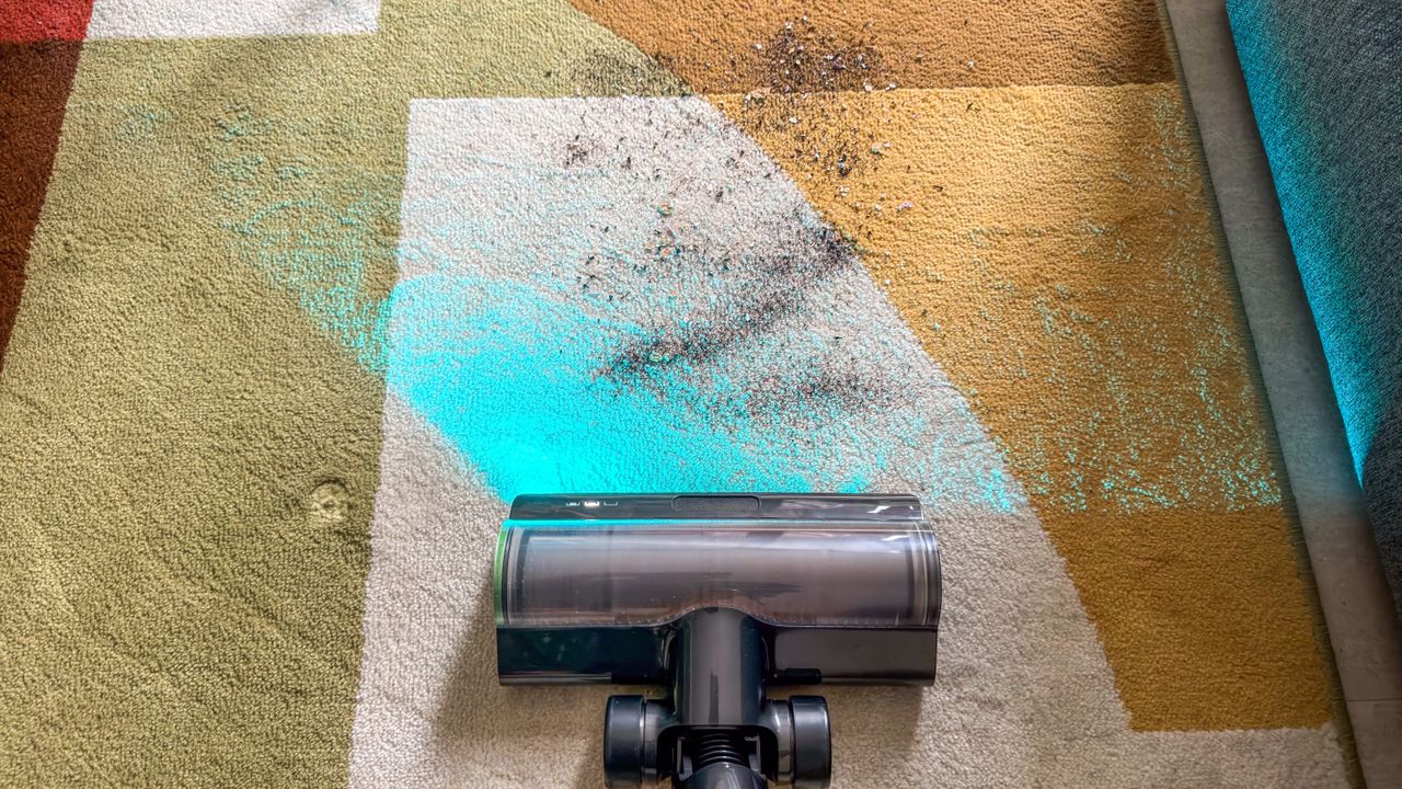Dreame Z50 Station being used to clean a dirty rug
