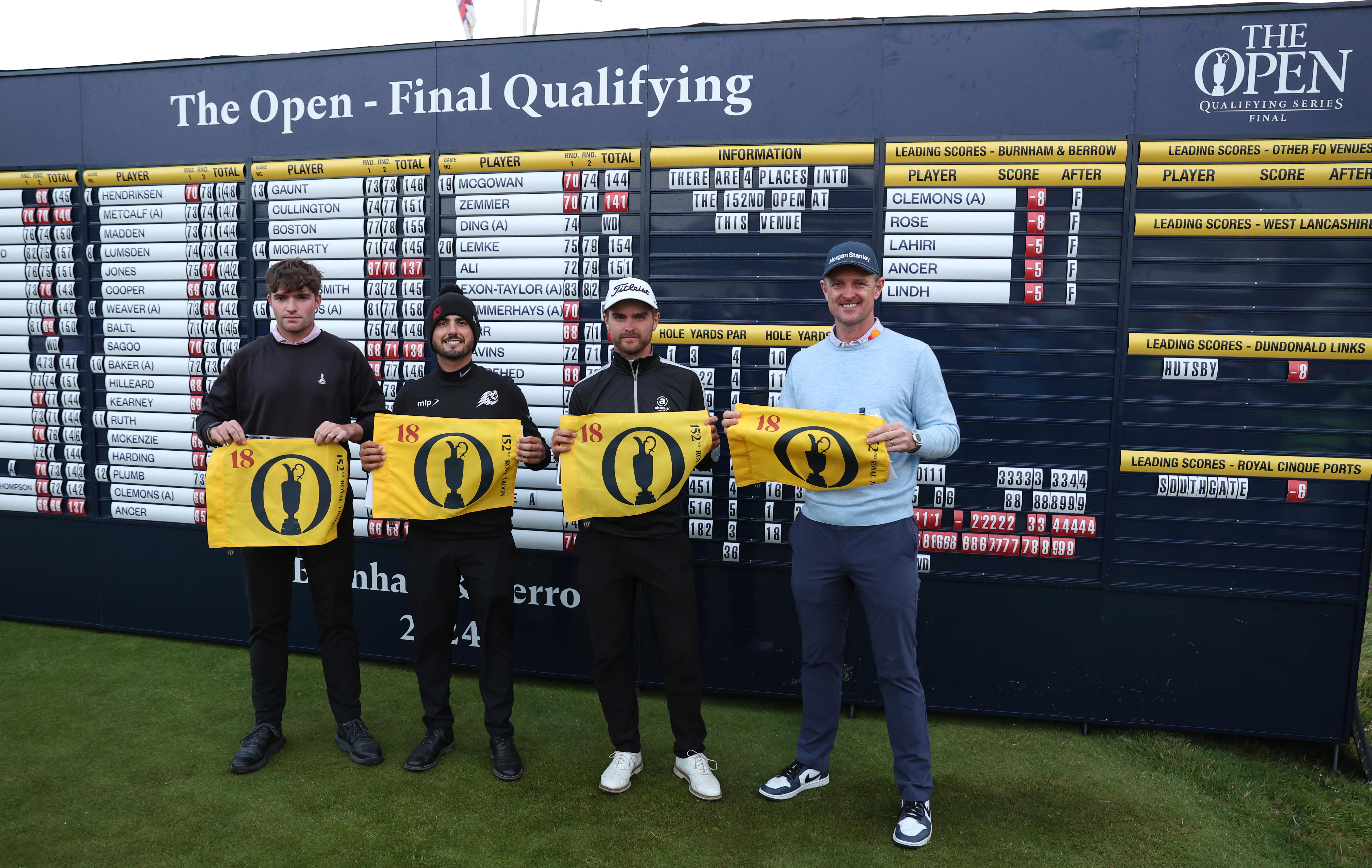 Four golfers pose with Open flags at Final Qualifying