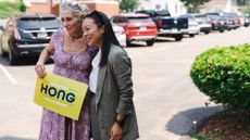 Francesca Hong meets with a supporter in Racine, Wisconsin