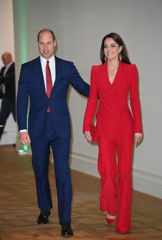 Queen Rania red trouser suit - Kate Middleton