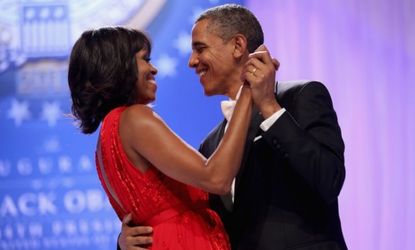 President Obama dances with his lady in red at the Commander-in-Chief Ball.