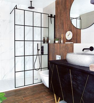 white bathroom with wood panelled wall