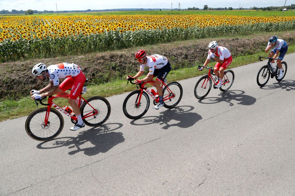 PRZEMYSL POLAND AUGUST 01 LR Piotr Brozyna of Poland and Team Poland Polka Dot Mountain Jersey Edward Theuns of Belgium and Team Trek Segafredo Marcin Budzinski of Poland and Team Poland and Matthias Brandle of Austria and Team Israel Premier Tech compete in the breakaway during the 79th Tour de Pologne 2022 Stage 3 a 2379km stage from Kranik to Przemyl TdP22 WorldTour on August 01 2022 in Przemysl Poland Photo by Bas CzerwinskiGetty Images