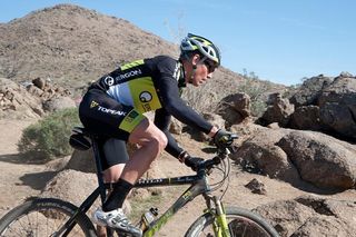 Dave Wiens from Team Topeak - Ergon rounds the corner before descending the rock drop option at the Kona Bikes 24 Hours in the Old Pueblo race in Tucson. Wiens' Topeak-Ergon team took second place in the Five Person Co-ed 150-199 Combined Age category of the event.