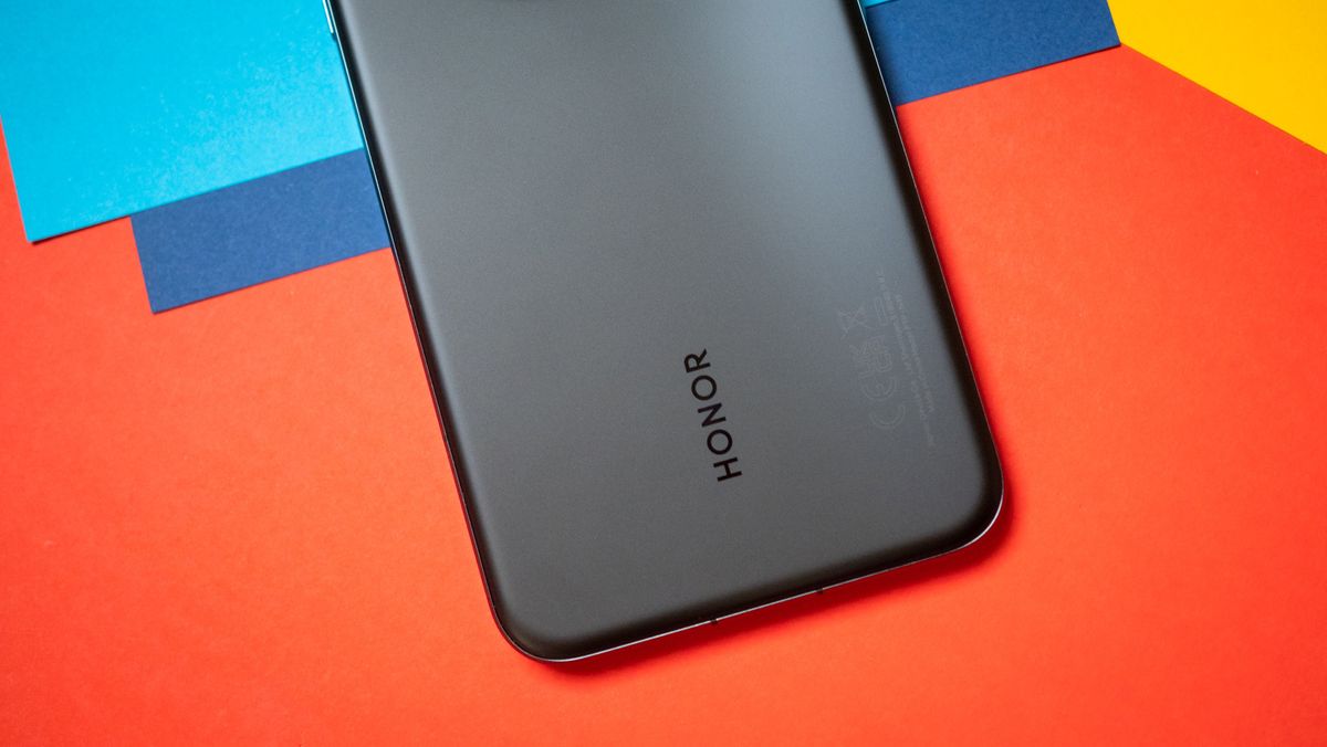 Honor Magic 7 Pro back view against colorful background with Honor logo visible