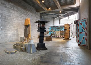 Sculptures on display at an exhibition by Tom Sachs