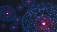 An illustration of magenta and purple iridescent spots and large spheres.