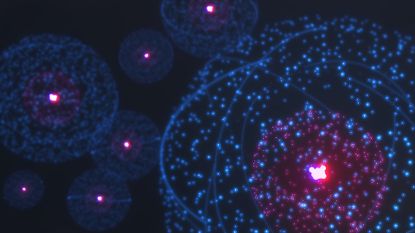 An illustration of magenta and purple iridescent spots and large spheres.