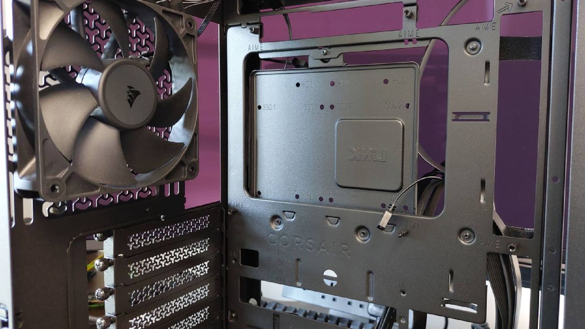 The Corsair Frame 4000X PC case seen at various stages of a PC build. This is a modular, mid-tower case with lots of options for customisation.