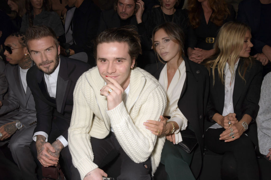 PARIS, FRANCE - JANUARY 17: (L to R) David Beckham, Brooklyn Beckham, Victoria Beckham and Kate Moss attend the Dior Homme Menswear Fall/Winter 2020-2021 show as part of Paris Fashion Week on January 17, 2020 in Paris, France. (Photo by David M. Benett/Dave Benett/Getty Images)