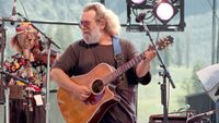 Jerry Garcia of the Grisman-Garcia band performs at Squaw Valley ski area on August 25, 1991 in Squaw Valley, California
