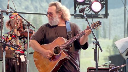 Jerry Garcia of the Grisman-Garcia band performs at Squaw Valley ski area on August 25, 1991 in Squaw Valley, California