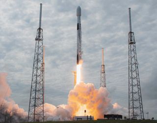 A SpaceX Falcon 9 rocket launches 60 Starlink satellites on Oct. 24, 2020, the 100th successful liftoff for Elon Musk's company.