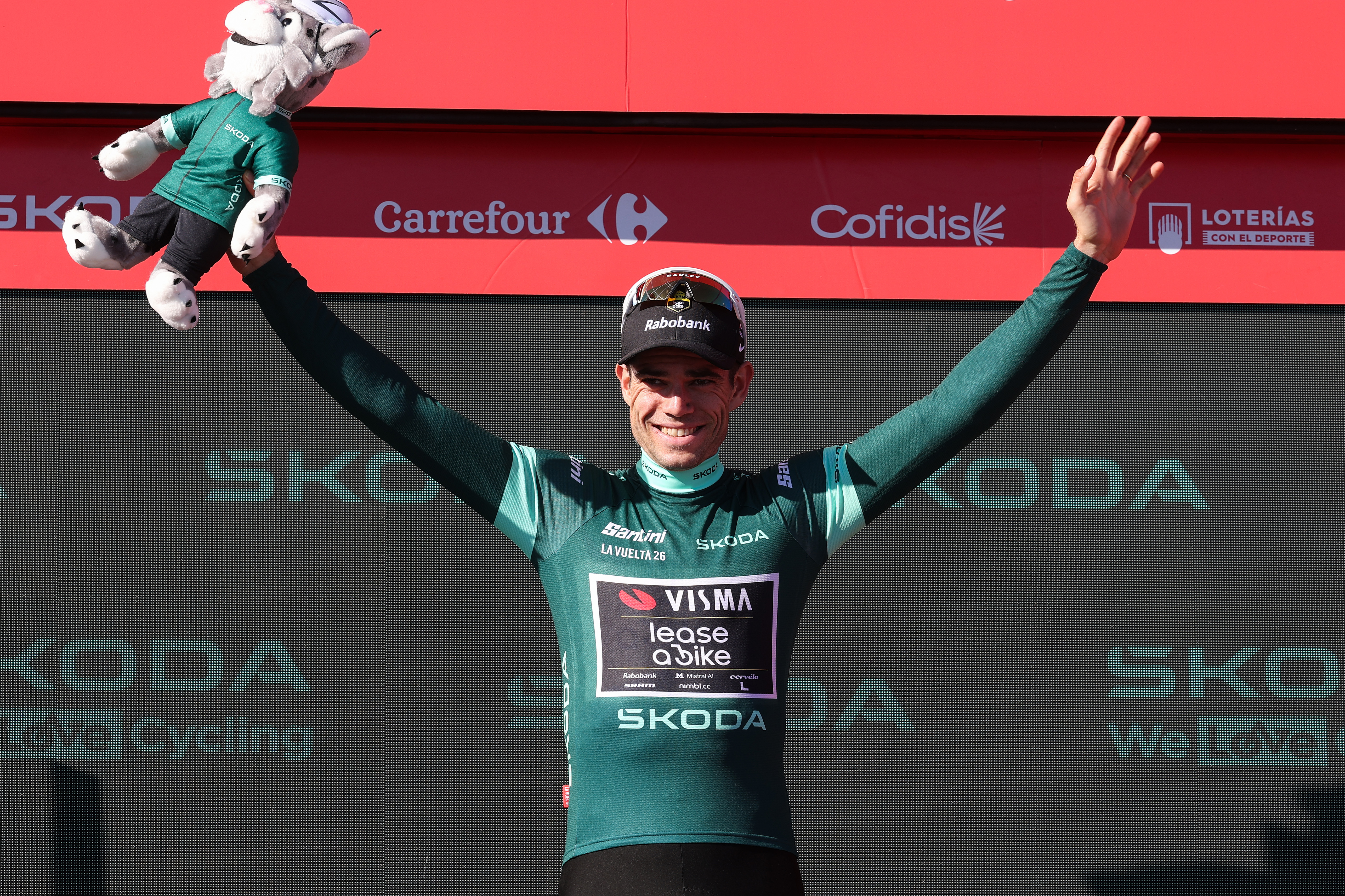 ALTO DE AITANA, SPAIN - AUGUST 30: Wout Van Aert of Belgium and Team Visma | Lease a Bike celebrates at podium as Green Points Jersey winner during the La Vuelta - 81st Tour of Spain 2026, Stage 9 a 187.4km stage from Villajoyosa to Alto de Aitana 1544m / #UCIWT / on August 30, 2026 in Alto de Aitana, Spain. (Photo by Alexander Hassenstein/Getty Images)