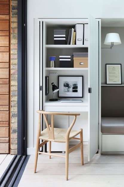 Closet office in the corner of an open plan kitchen