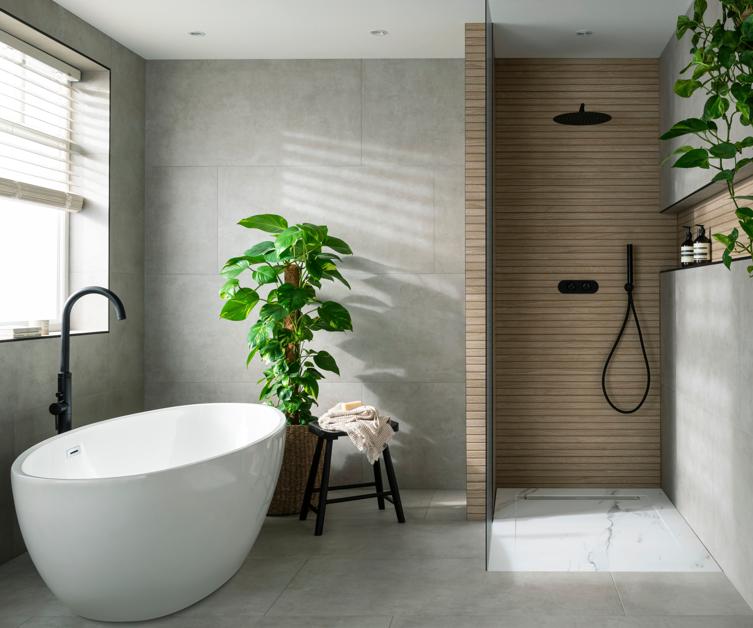 large grey bathroom tiles with wooden effect tiled shower