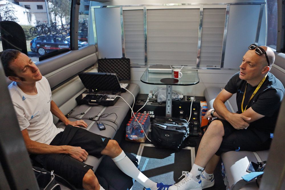 Team Sky's Dave Brailsford and Bradley Wiggins in the team bus at the 2012 Tour de France