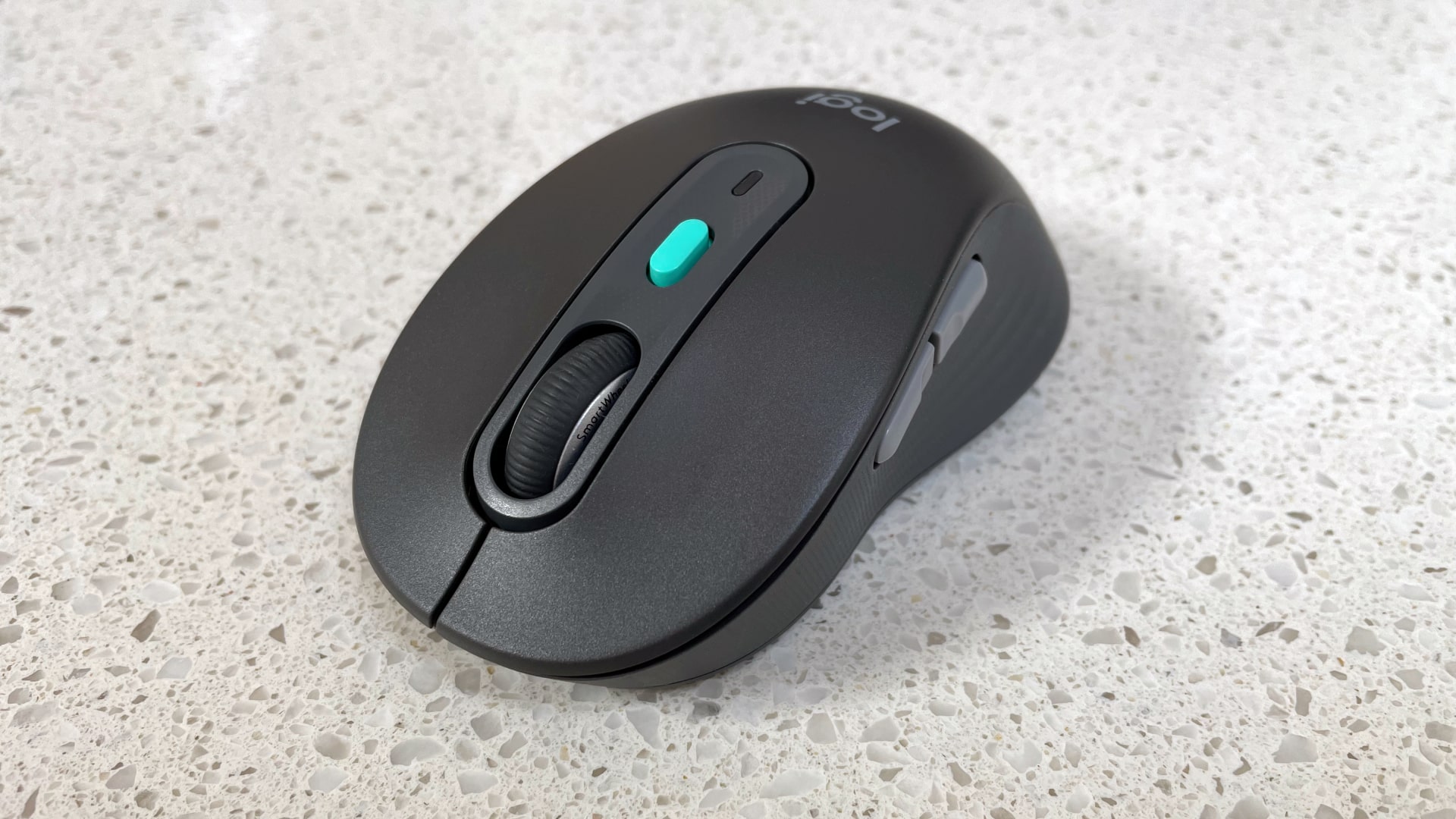 The Logitech Signature AI Edition M750 mouse on a worktop.