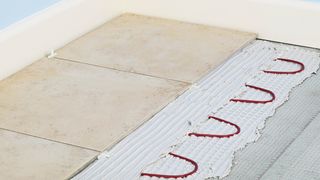Electric Underfloor Heating laying tiles