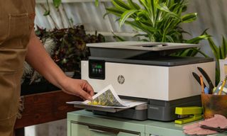 Staples promotional photo with HP printer