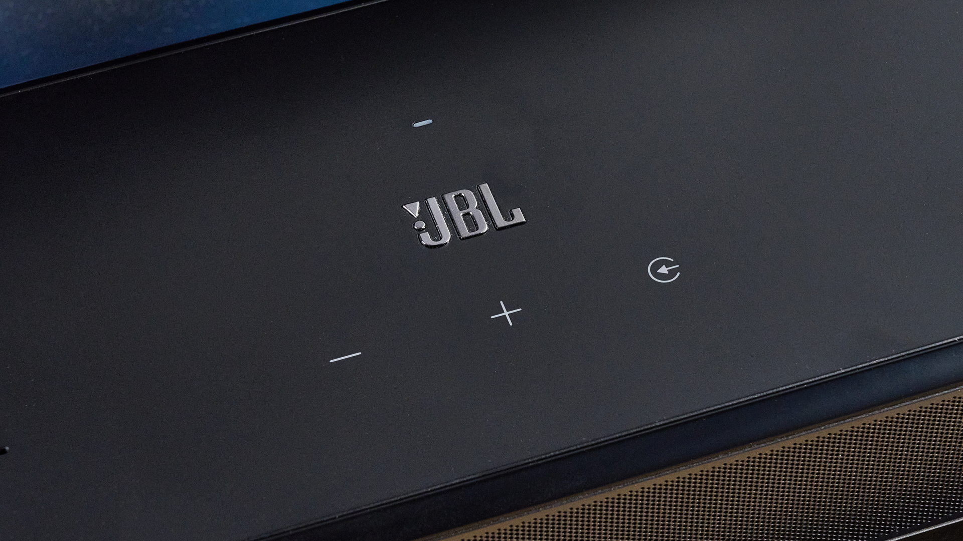 the jbl bar 1300xmk2 in black photographed against the blue tom's guide background