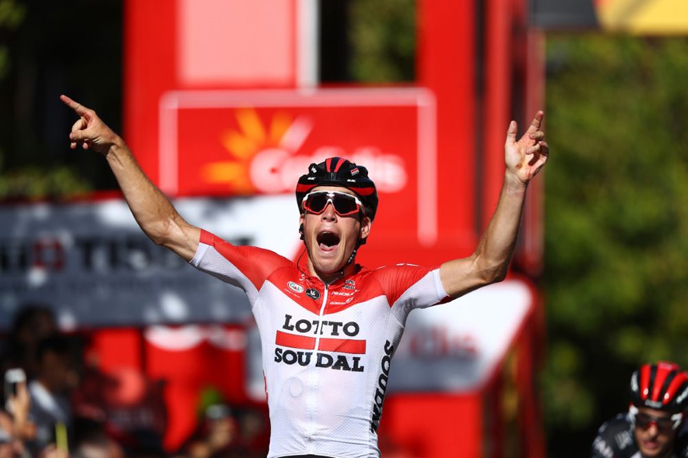 Jelle Wallays (Lotto Soudal) lets out a cheer as he hits the line