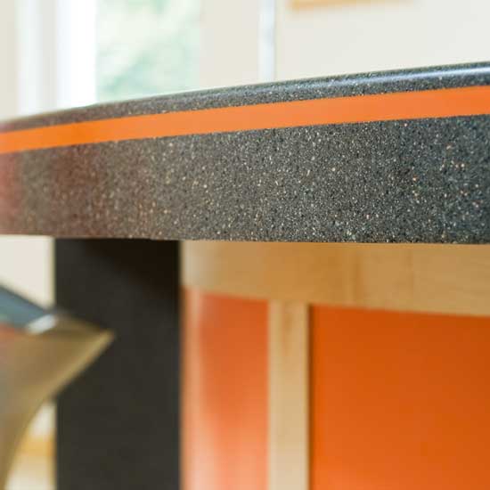 kitchen with worktop and orange coloured
