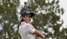 Rickie Fowler reacts after a drive